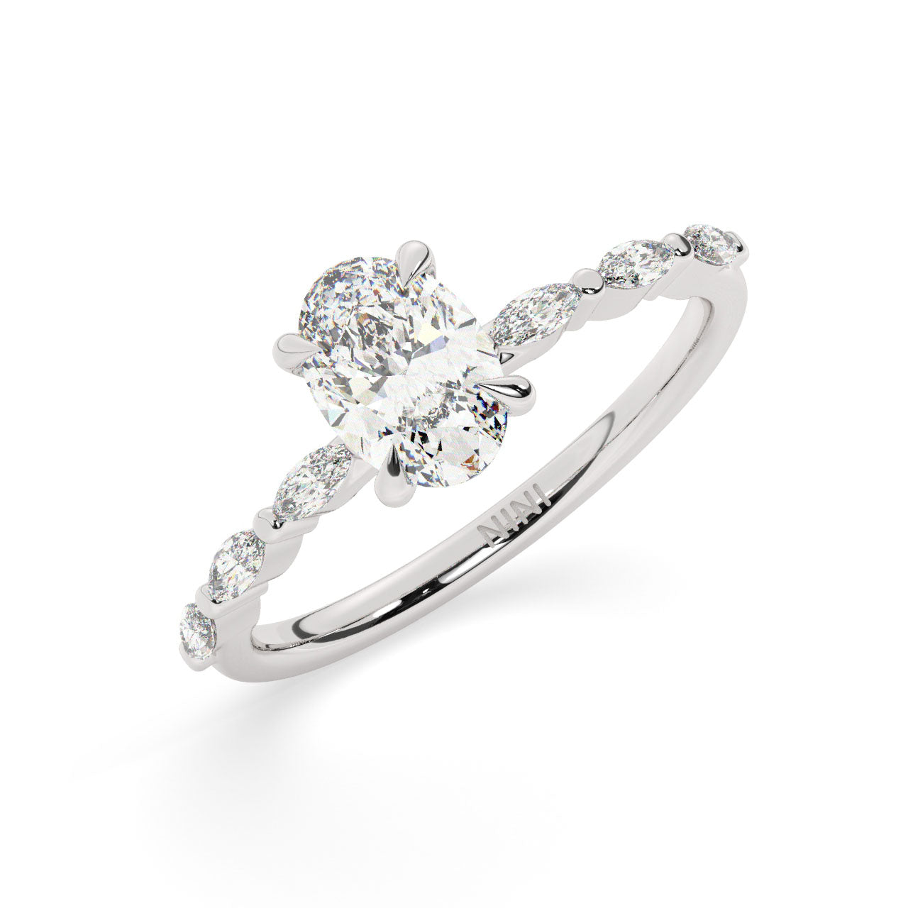 Oval cut diamond engagement ring, The band is set with Marquise cut diamonds.
14K gold.