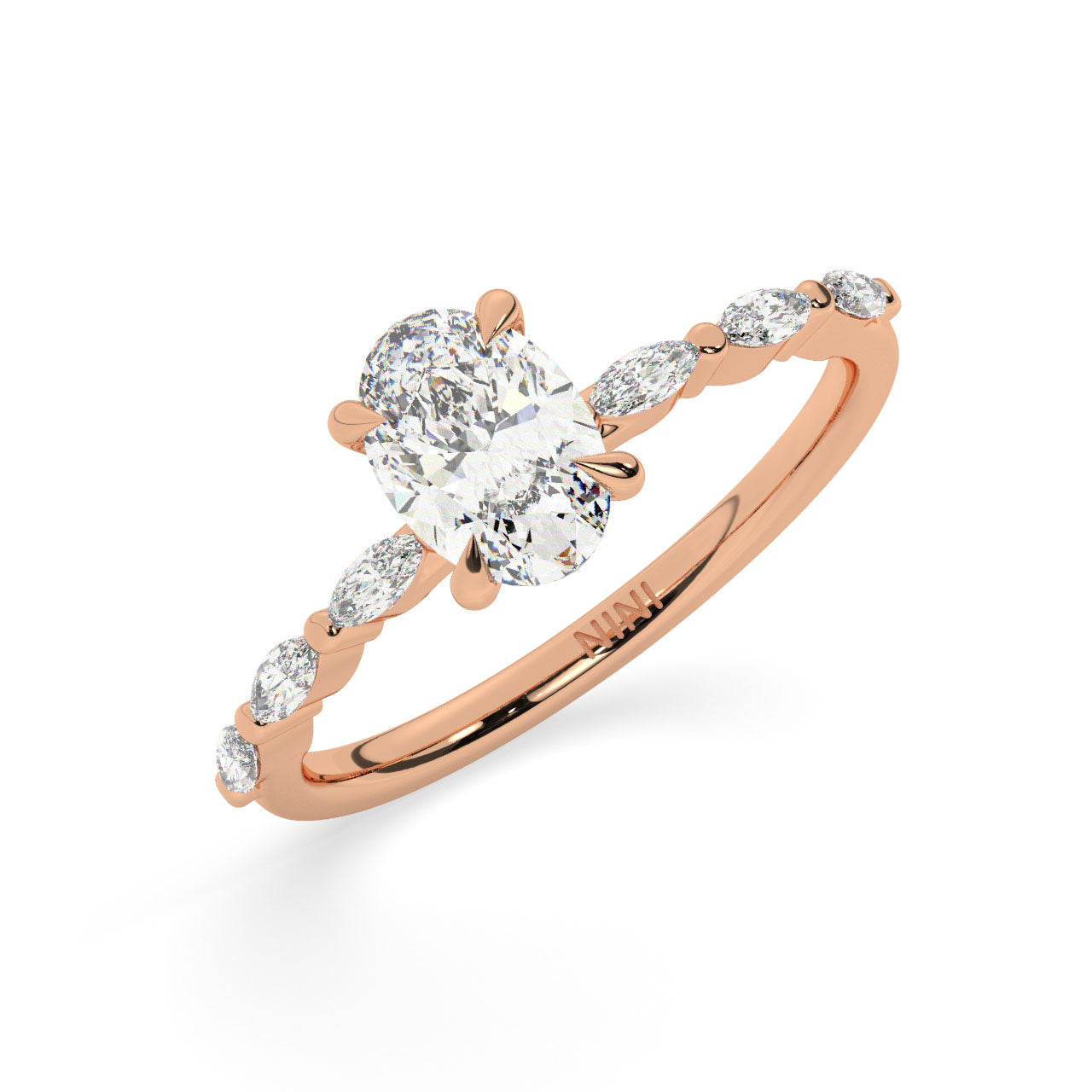Oval cut diamond engagement ring, The band is set with Marquise cut diamonds.
14K gold.