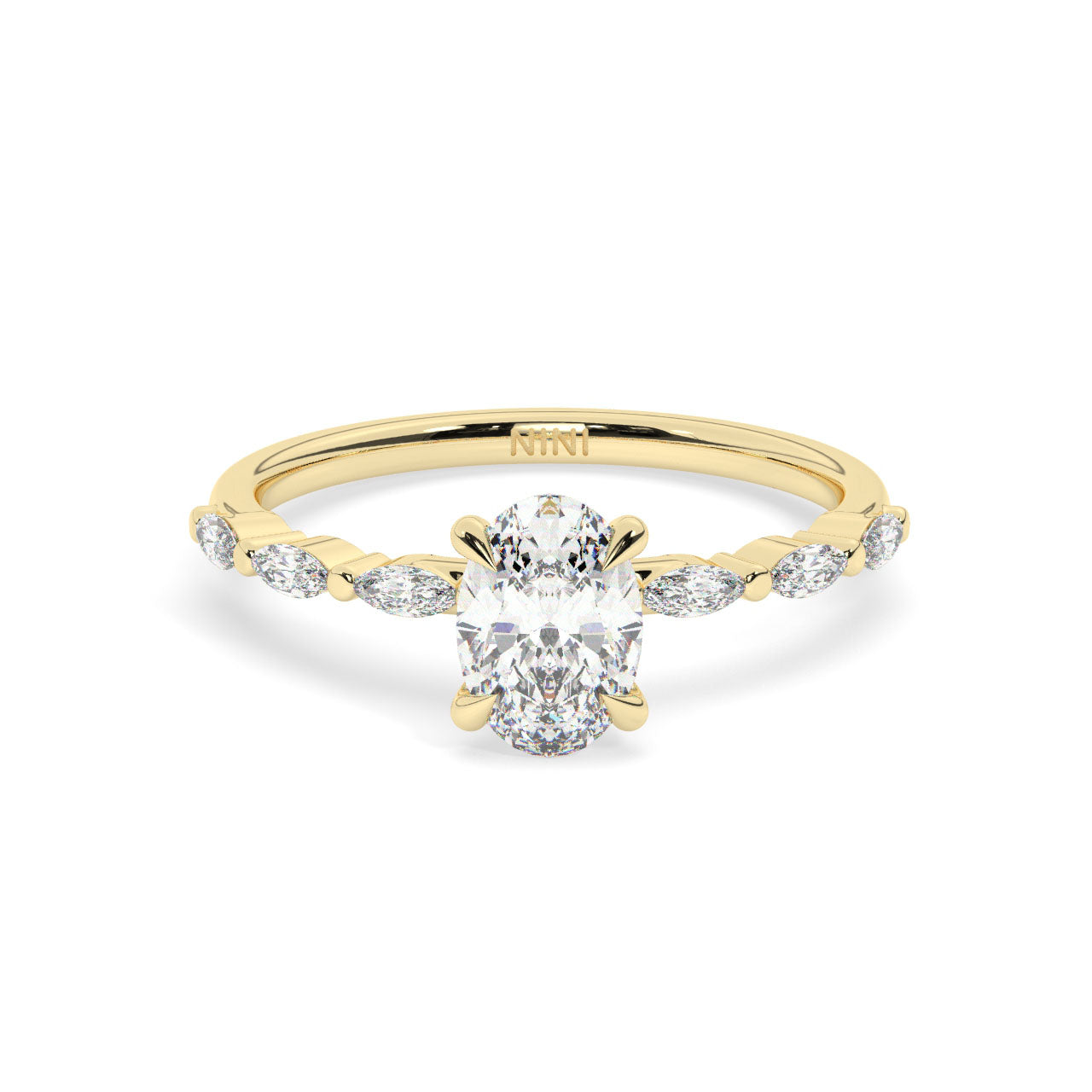 Oval cut diamond engagement ring, The band is set with Marquise cut diamonds.
14K gold.