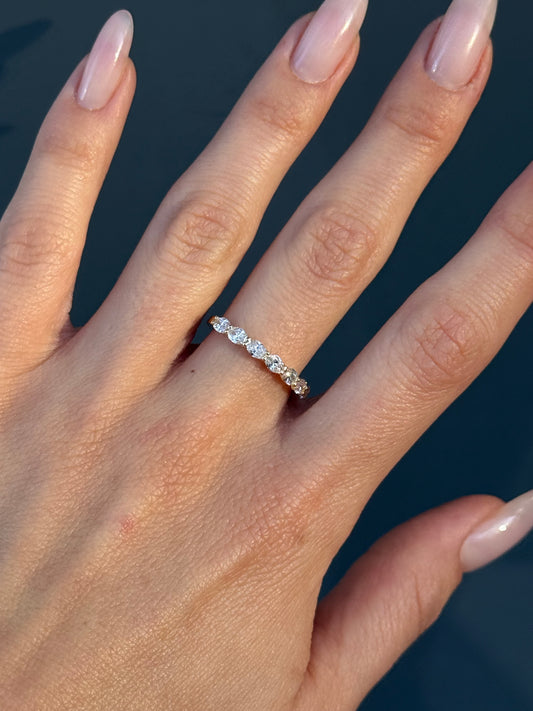 East West Oval Cut Diamonds Ring