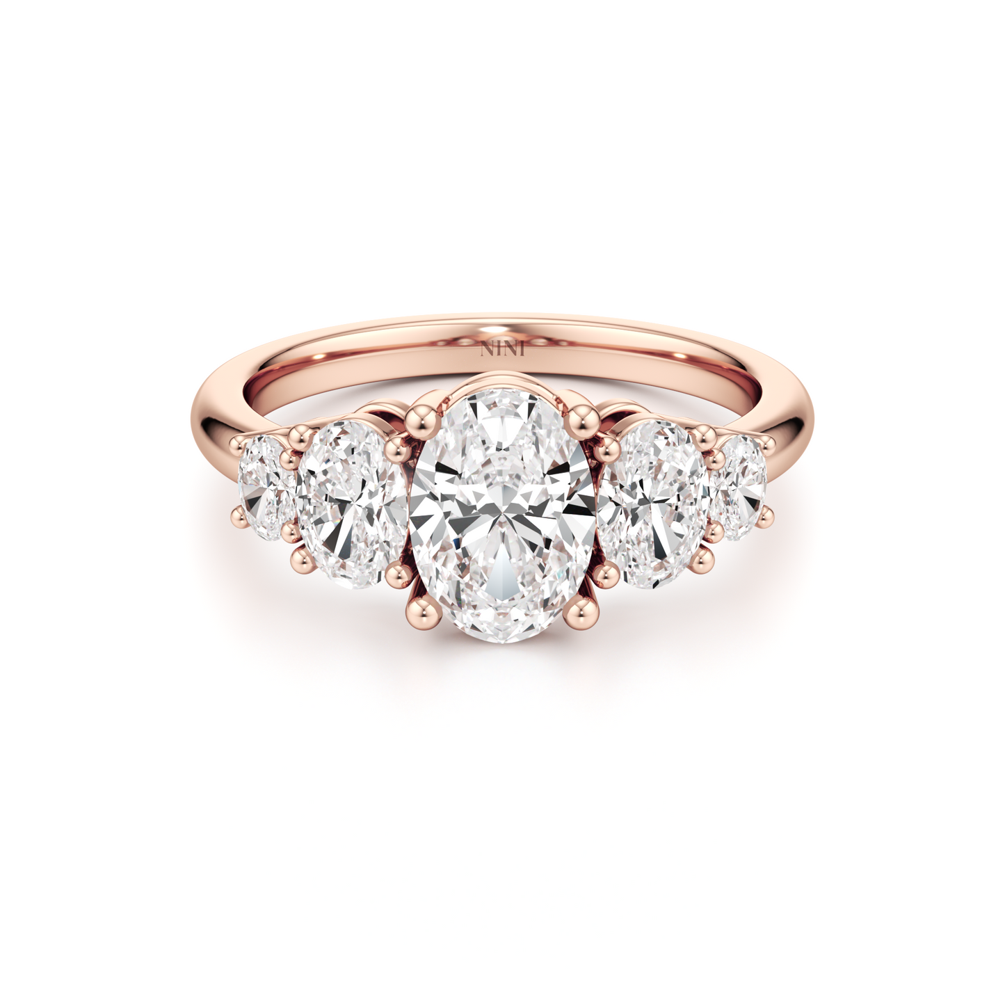 Five Oval Cut Diamonds Engagement Ring