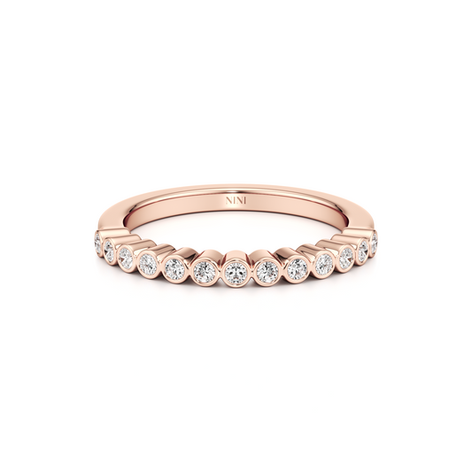 Bezel cut round diamonds row ring