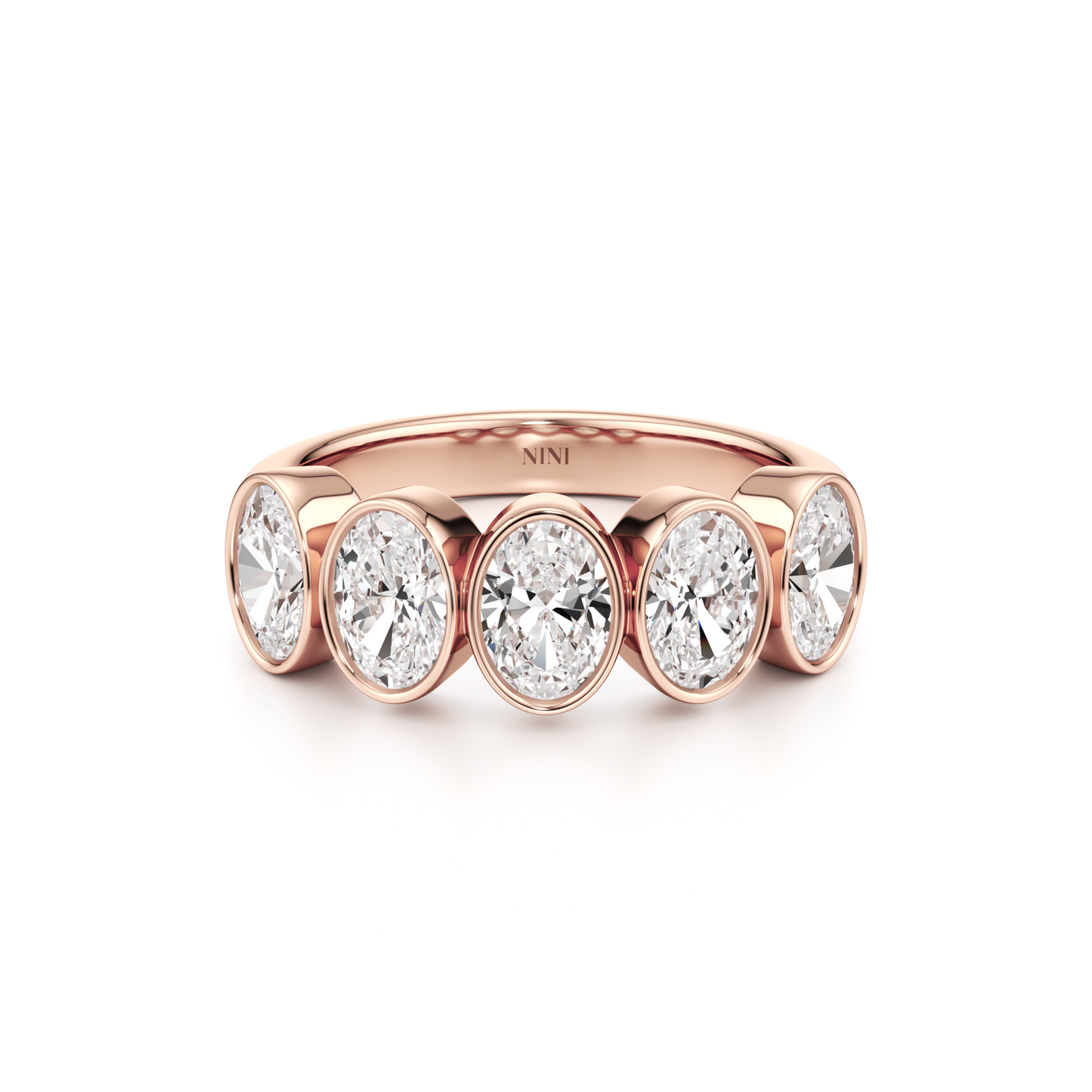 Five Oval Cut Diamonds Bezel Ring