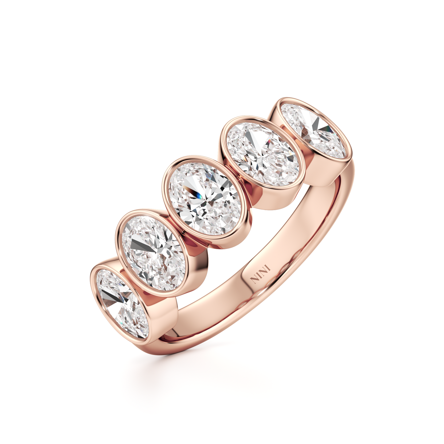 Five Oval Cut Diamonds Bezel Ring