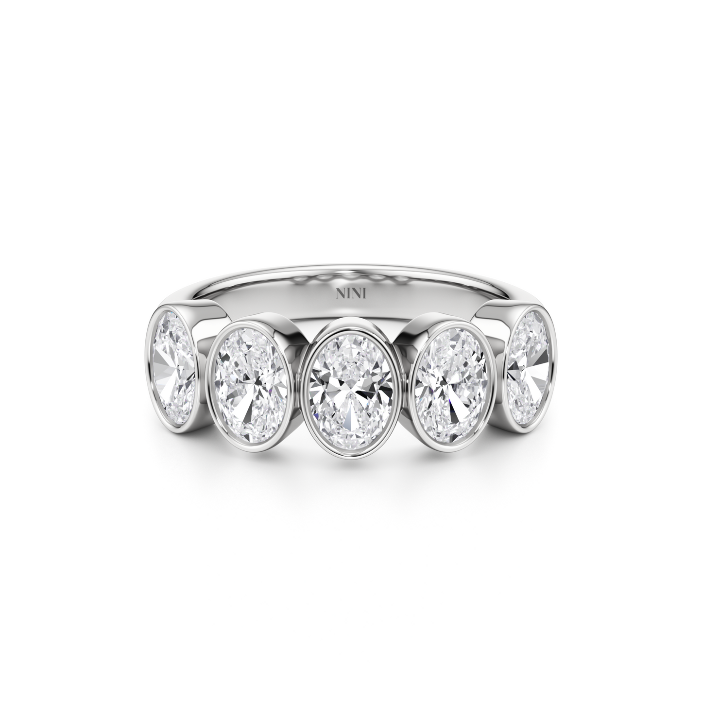 Five Oval Cut Diamonds Bezel Ring
