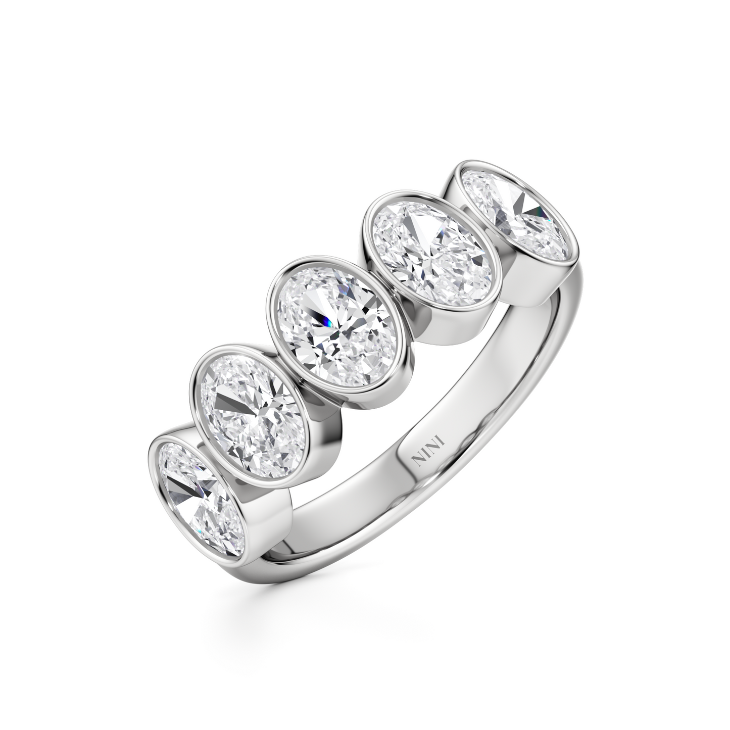 Five Oval Cut Diamonds Bezel Ring