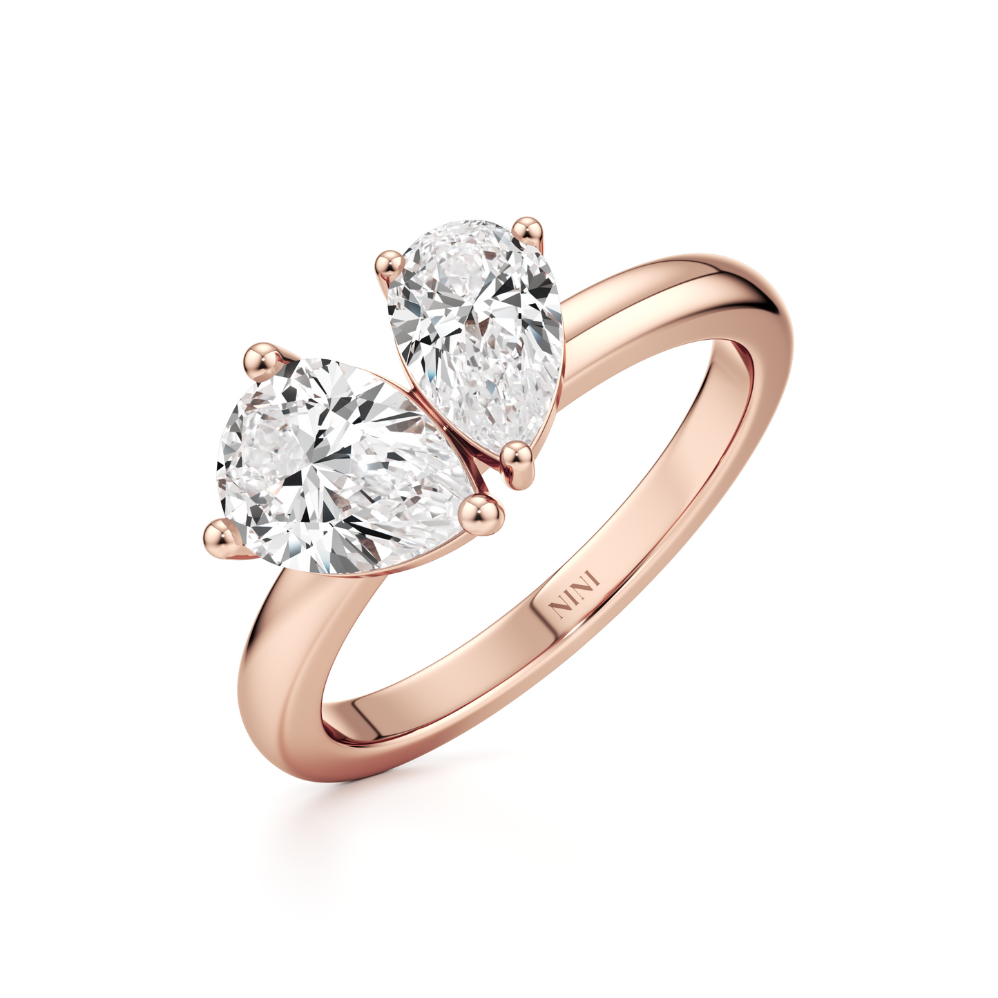 טבעת אירוסין Toi et moi - יהלום טיפה ויהלום אמרלד